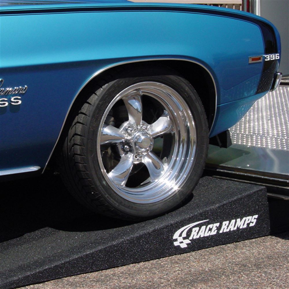 Blue Chevelle SS rear wheel parked on a Race Ramps RR-TR-8 trailer ramp