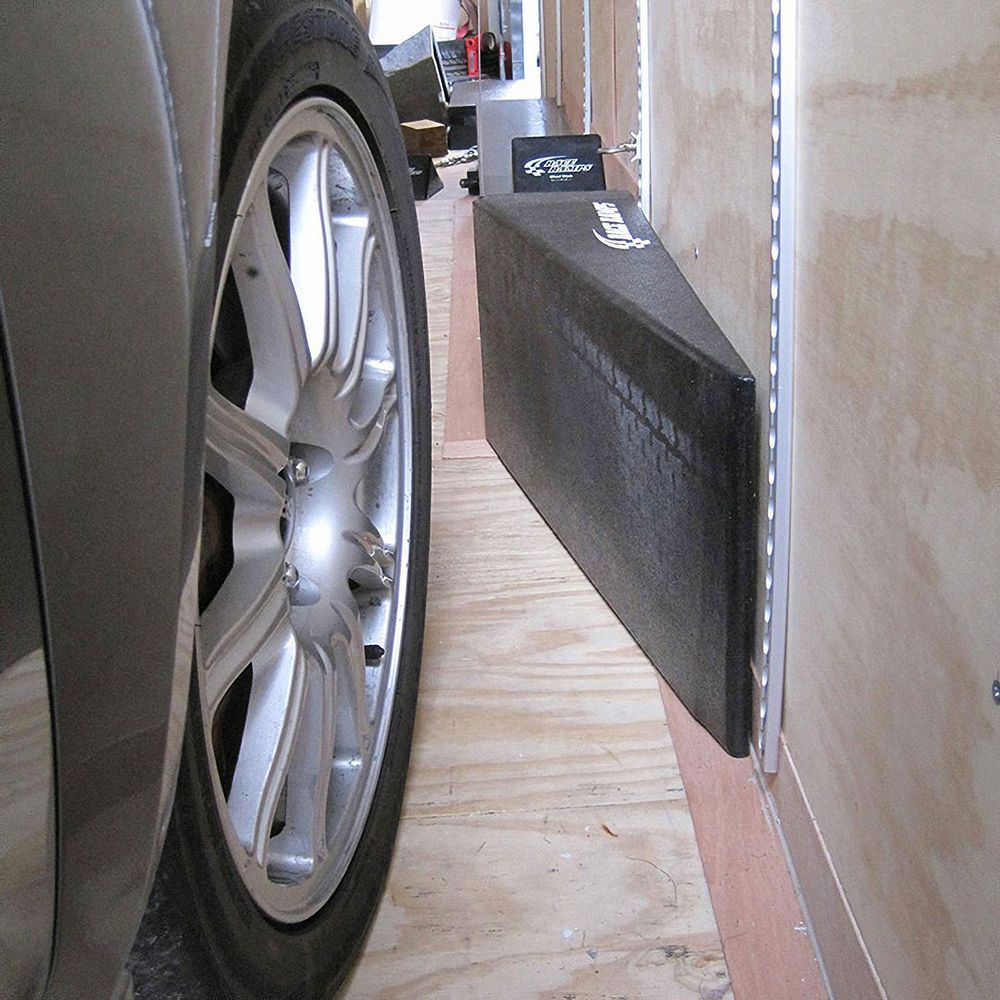 Race Ramps Trailer Side Kick easing a wheel over a trailer threshold