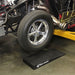 Race car on Race Ramps Trak-Jax ramps in a workshop