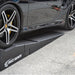 Low sports car climbing a Race Ramps XTender into a car ramp