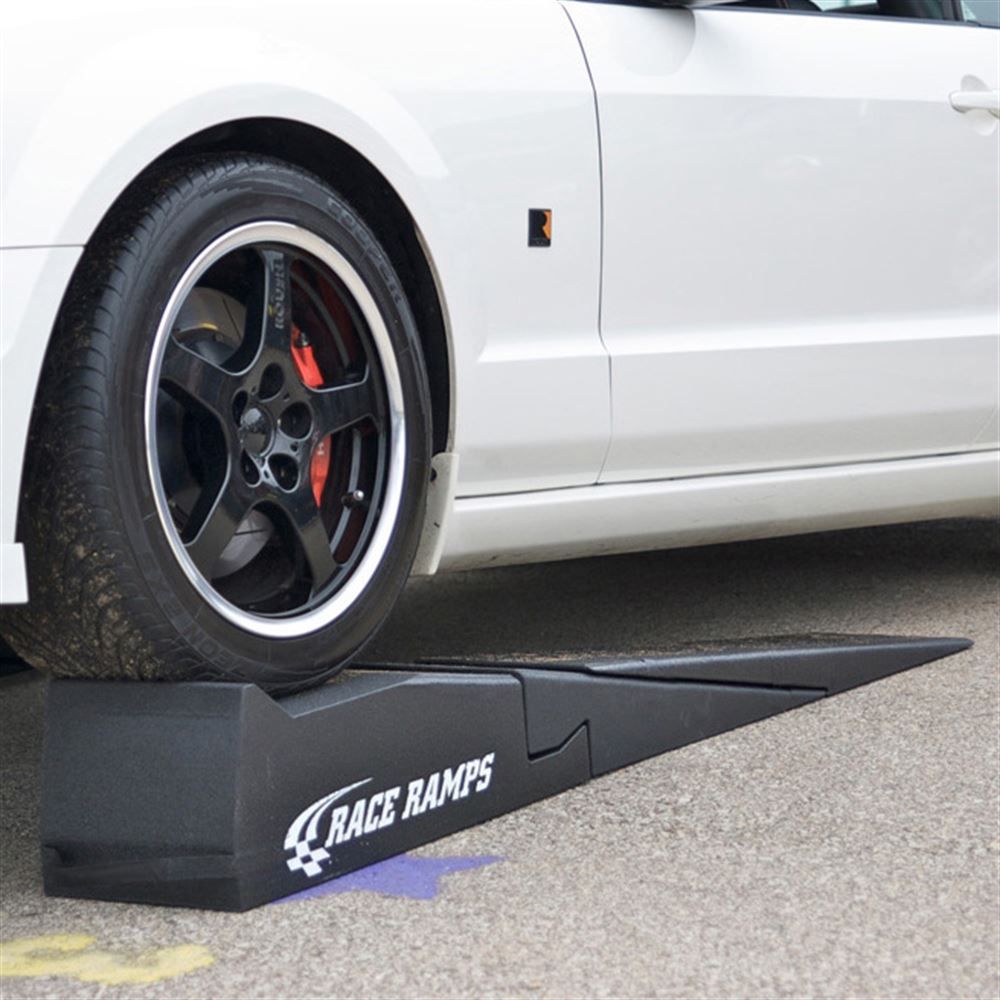 Mustang front wheel on a Race Ramps ramp with an XTender fitted